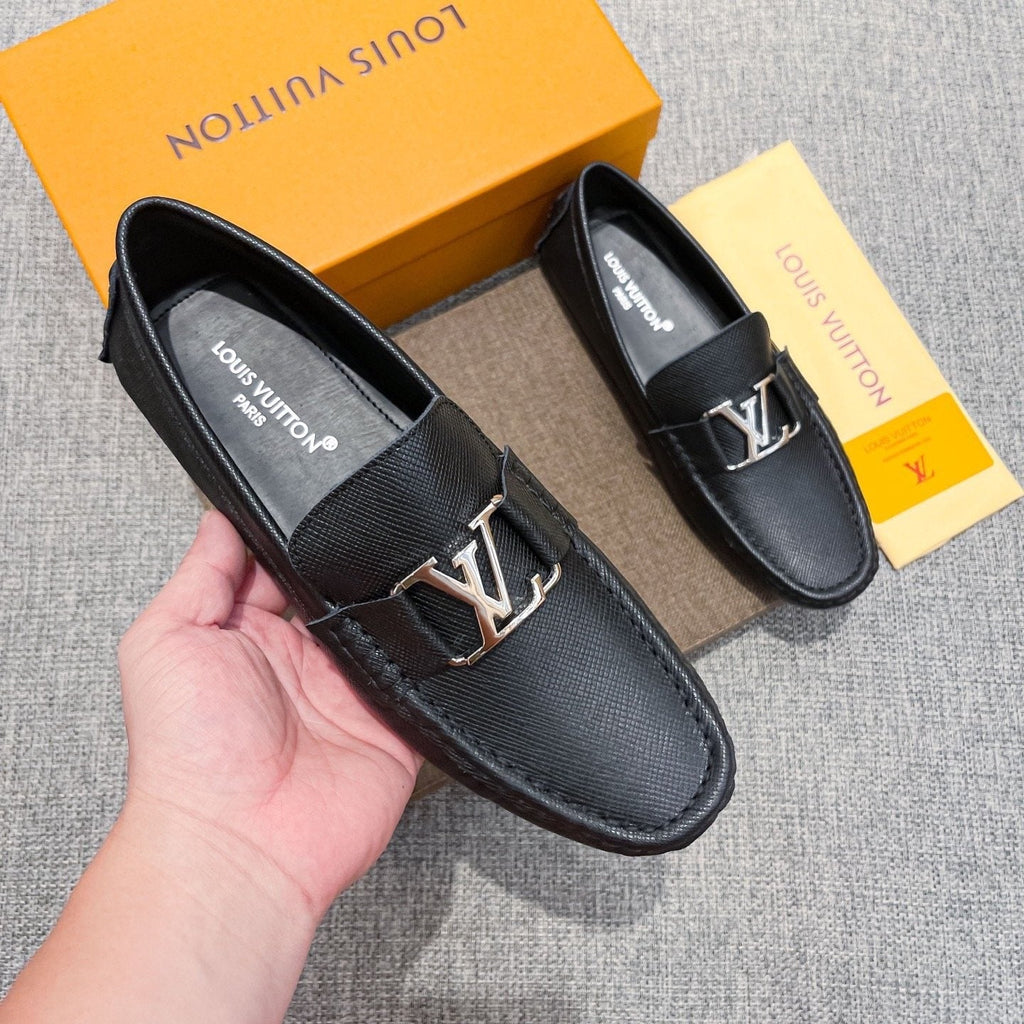 Louis Vuitton Black Metal-Hardware Loafers — model