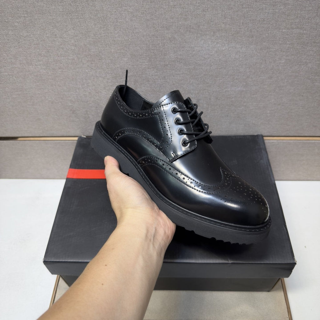 Prada Wingtip Lace-Up Shoes — model