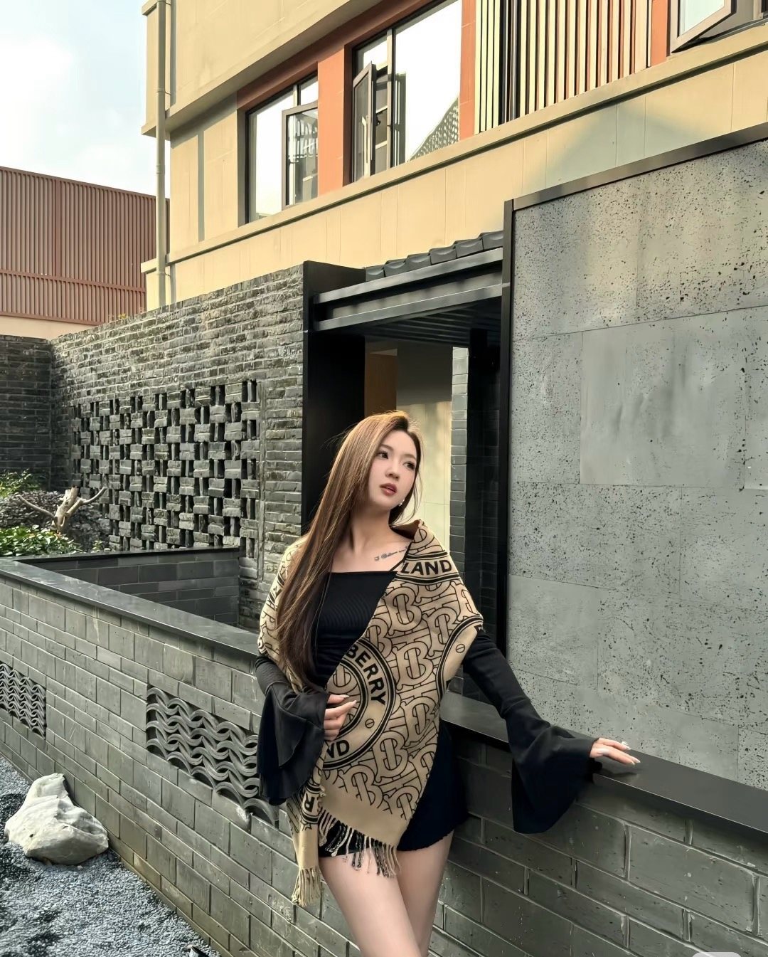 Burberry Reversible Check Fringe Scarf — model